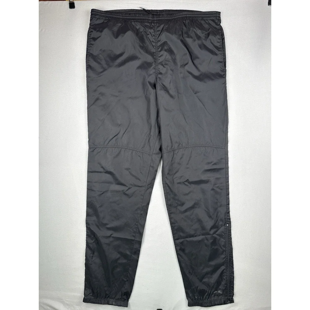 Vintage 90s Nike Black Nylon Track Pants Swoosh Zip Leg Windbreaker L